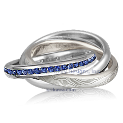 White Mokume Rolling Ring with Blue Sapphires