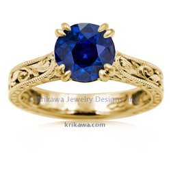 Delicate Vintage Solitaire Engagement Ring in 18k Yellow gold with blue sapphire