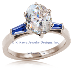 Petite Baguette in 18k white gold with oval moissanite and blue sapphire baguette accent stones