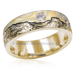 Mokume Mountain wedding band with diamond in 14k yellow gold and summer mokume