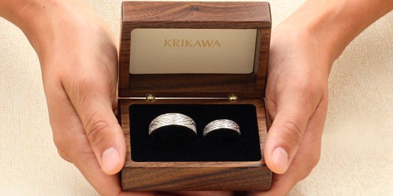 Wedding Rings in Krikawa Boxes in Hands