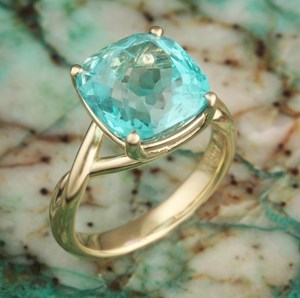 large cushion shaped emerald engagement ring