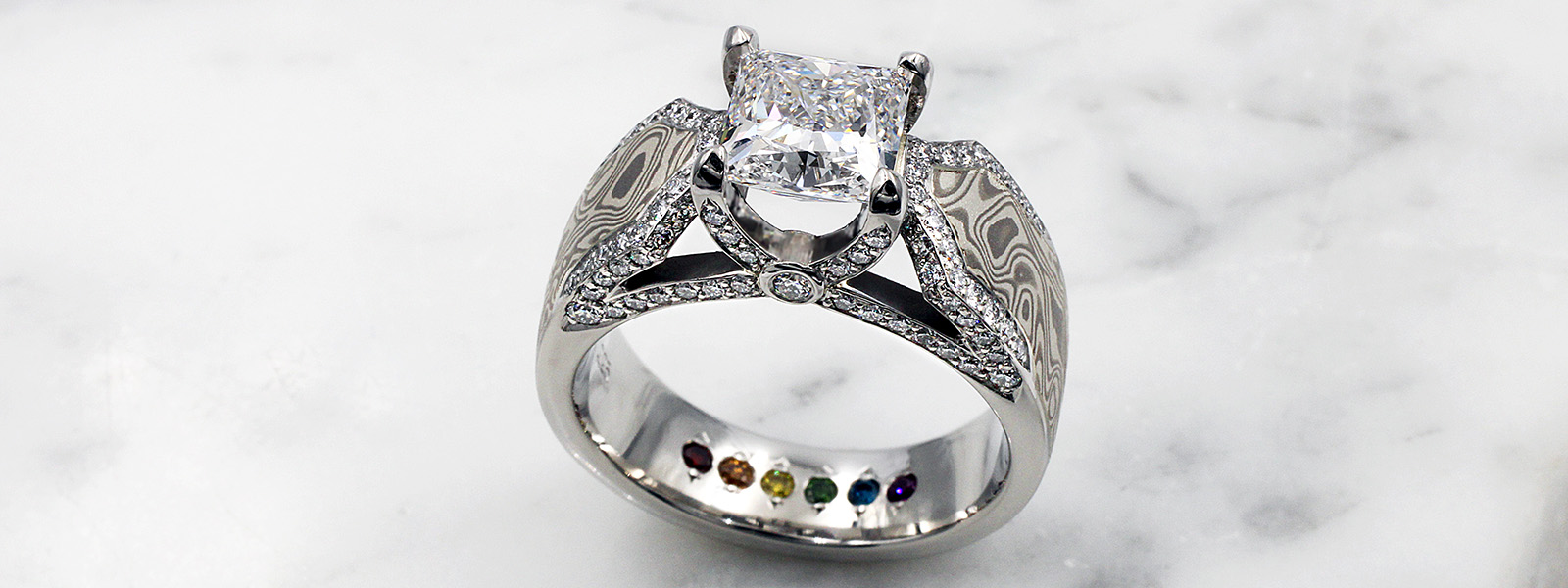 Birthstones inside engagement ring