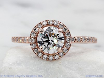 gorgeous diamond halo engagement ring in rose gold