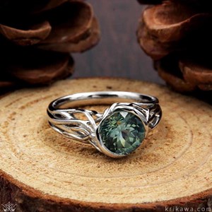Embracing Tree Branch Bezel Engagement Ring with Montana Sapphire