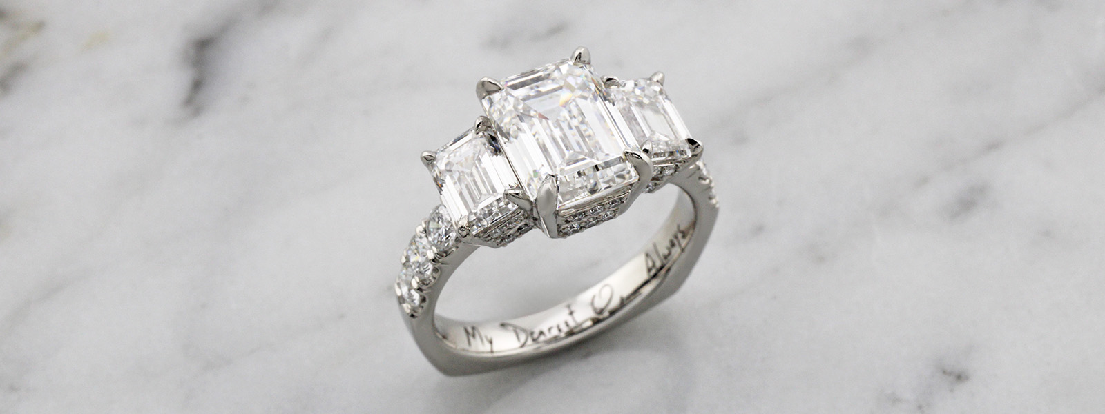Matched Diamond Pair in Emerald Cut French Set Pave Engagement Ring