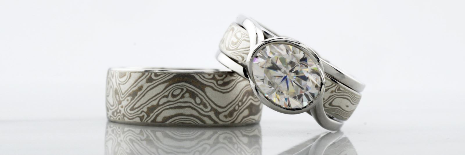 moissanite and mokume engagement ring set