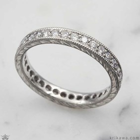 Hand engraved diamond wedding band