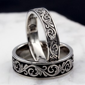 Hand engraved western floral wedding band set