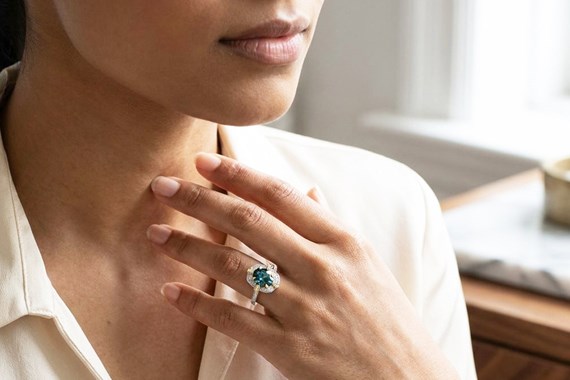 center stone in engagement ring on hand for stone size