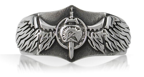 A detailed silver ring featuring a central emblem of a Spartan helmet crested with wings and a sword