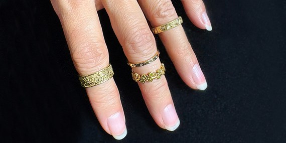 Gold Rings on Fingers