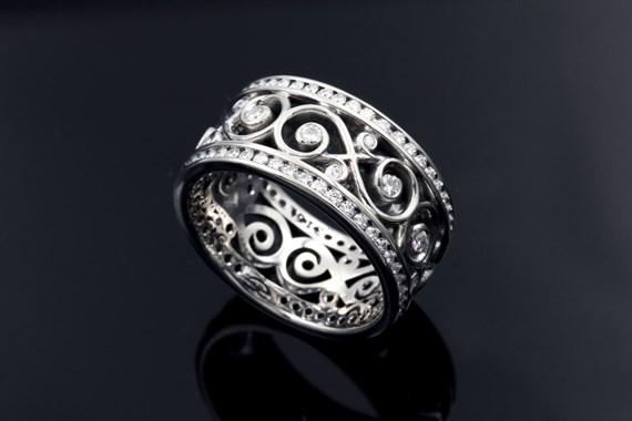 custom stainless steel wedding band with diamonds