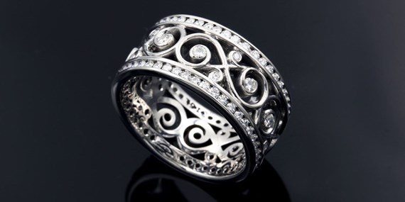 custom stainless steel wedding band with diamonds