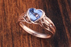 Embracing Branch Bezel Engagement Ring with Heart Cut Sapphire Solitaire