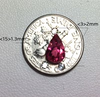 spinel size comparison with quarter