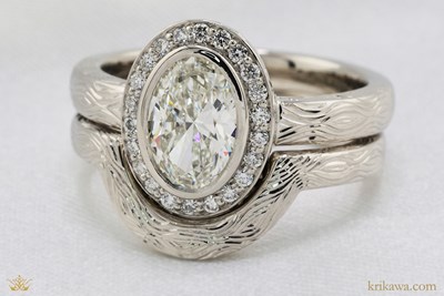 Bezel-Set Halo Engagement Ring with Hand Engraving in Platinum with Diamonds
