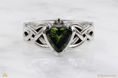Celtic Knot Claddagh Engagement Ring in platinum with trillion green sapphire