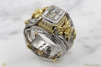 Luxury Ring in platinum and 18k yellow gold with emerald-cut diamond