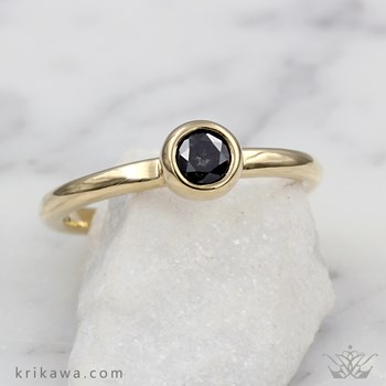 delicate black diamond bezel engagement ring