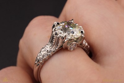 Egyptian Art Deco Engagement Ring in platinum with natural diamond