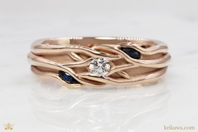 Embracing Branch Three Stone Wedding Band in 14k rose gold with natural sapphires and diamonds