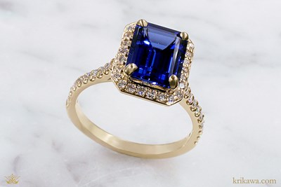 Emerald Cut Halo Engagement Ring in 14k yellow gold with lab-grown blue sapphire