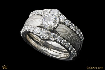 Graduated Diamond Enhancer in platinum with natural diamonds