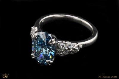 Mixed Shape Snowdrift Engagement Ring in Platinum with Blue Diamond