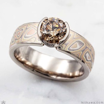 luxurious mokume gane engagement ring with champagne diamond