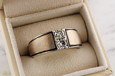Mokume Vertical Taper Wedding Band in Trigold Mokume with platinum liner and natural diamonds