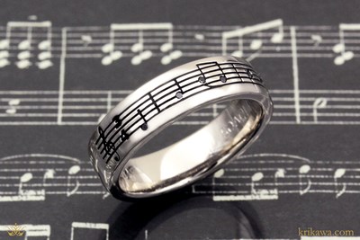 Musical Symbol Wedding Band with black diamonds in 14k pd white gold