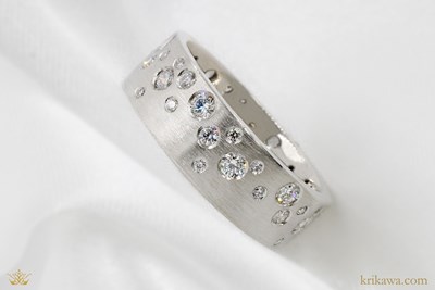 Raining Scattered Diamonds Wedding Band in platinum with natural diamonds
