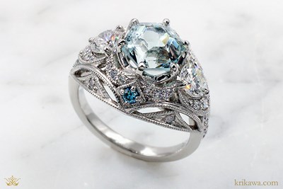Royal Three Stone Engagement Ring in platinum with an aquamarine