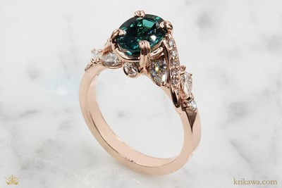 Swirl and Curl Engagement Ring in 14k rose gold with an oval tourmaline
