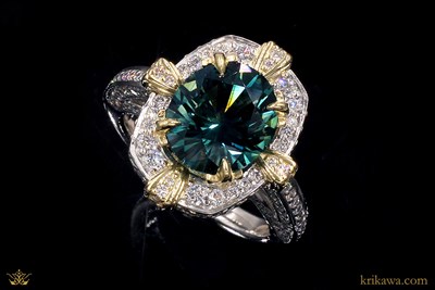Tudor Relic Engagement Ring in platinum and 18k yellow gold with Montana sapphire