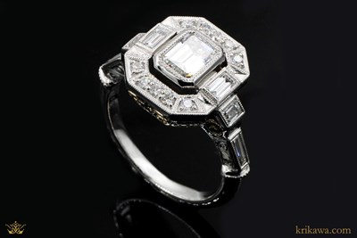 Vintage Floating Halo Engagement Ring in platinum and 14k yellow gold with diamonds