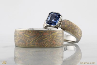 Trigold Mokume Wedding Band with a platinum liner