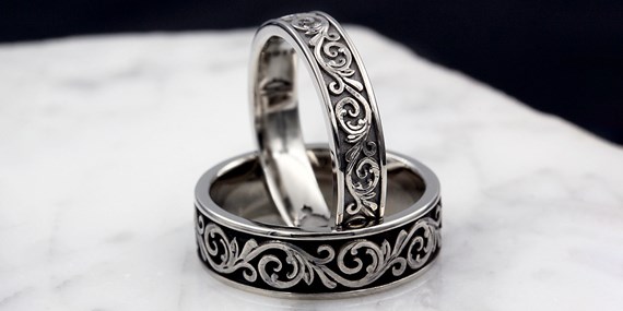 Western floral wedding bands in stainless steel
